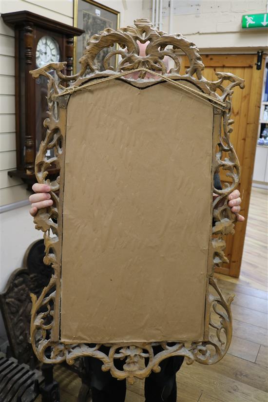 A Chippendale carved gilt wall mirror, the border finely pierced with scrolling acanthus leaves and foliage W.58cm